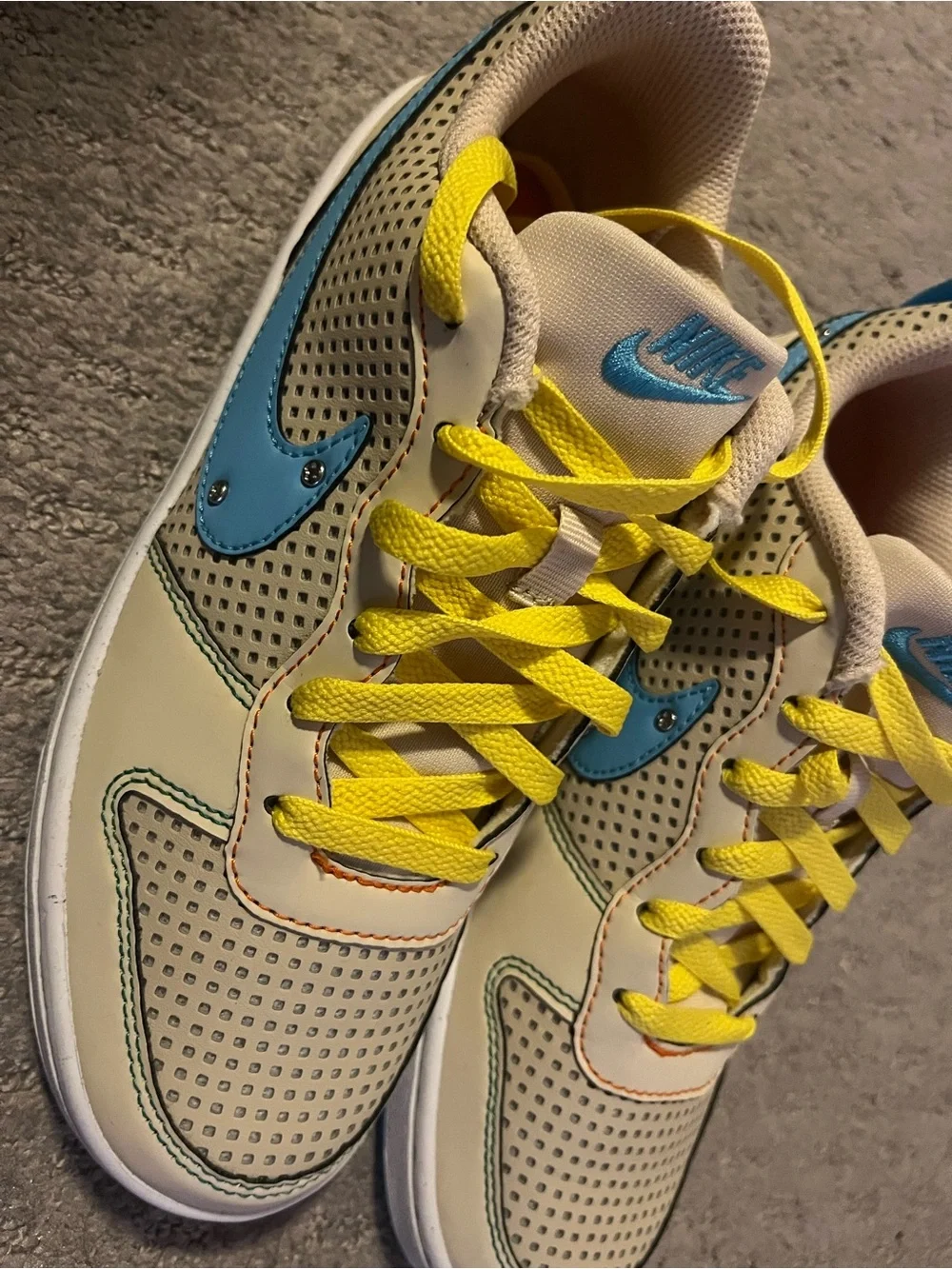 Nike woman 6.5 w / 5y Beige Sneakers with Blue Swoosh and Yellow Laces